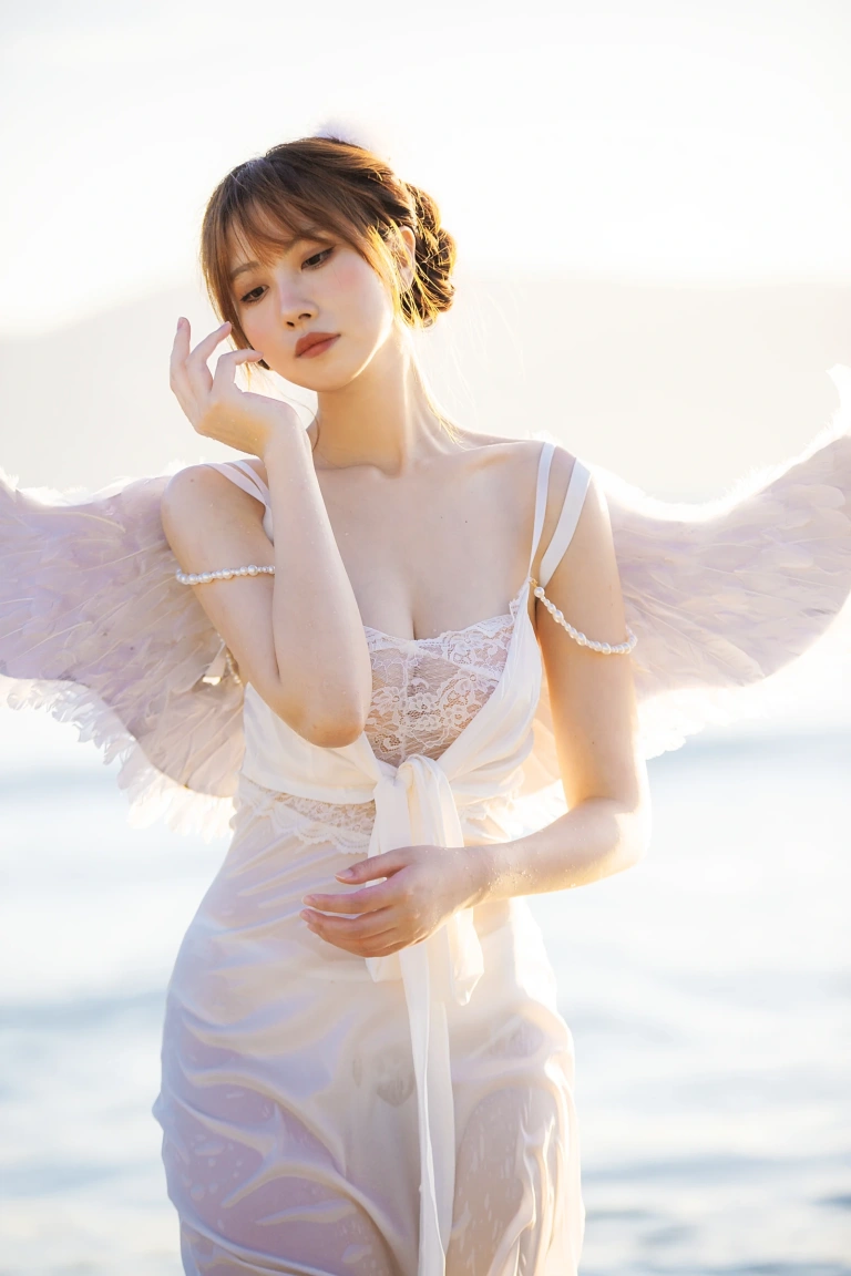 念雪《海边神明少女》主题写真：50张全套美图